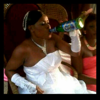Lady Drinking Beer On Wedding Gown.jpg